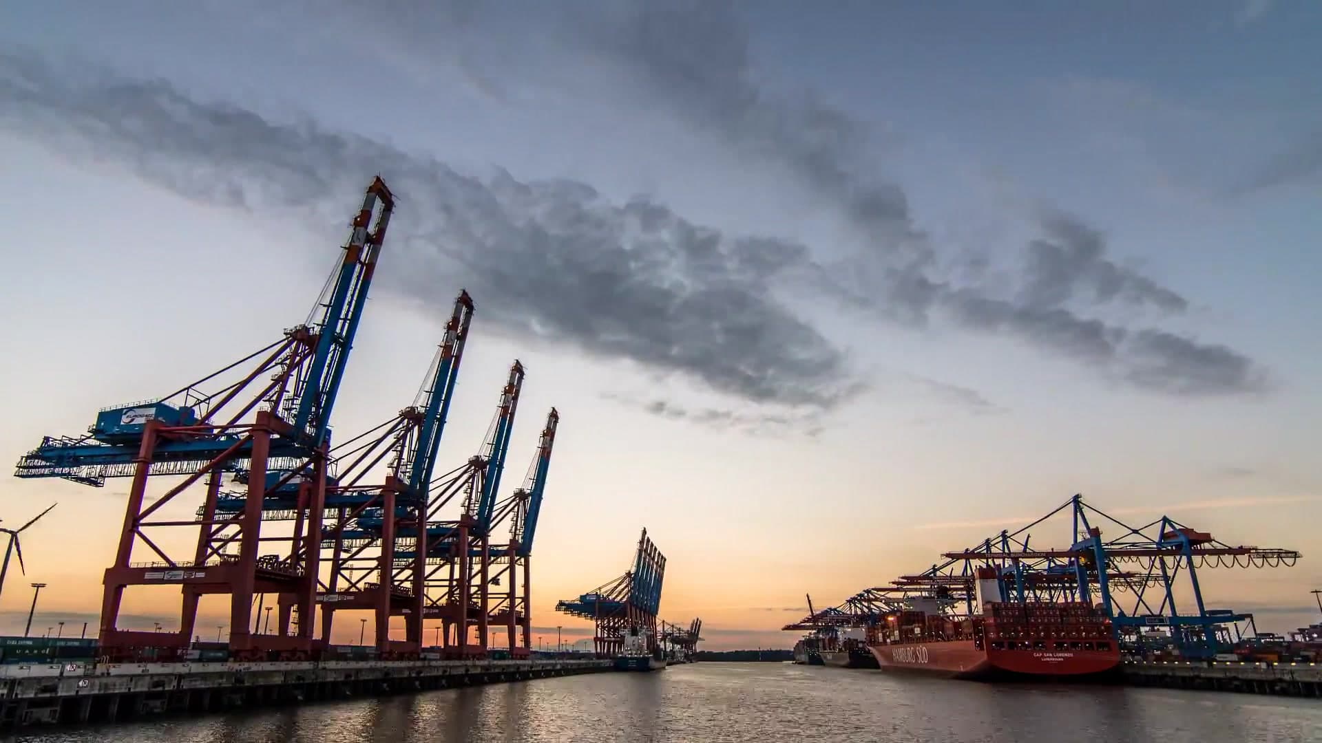 Container terminal cranes over a shipping channel at Hamburg